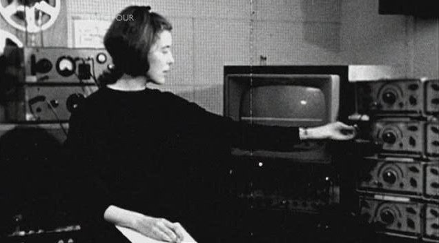 Delia Derbyshire twiddling a knob at the BBC